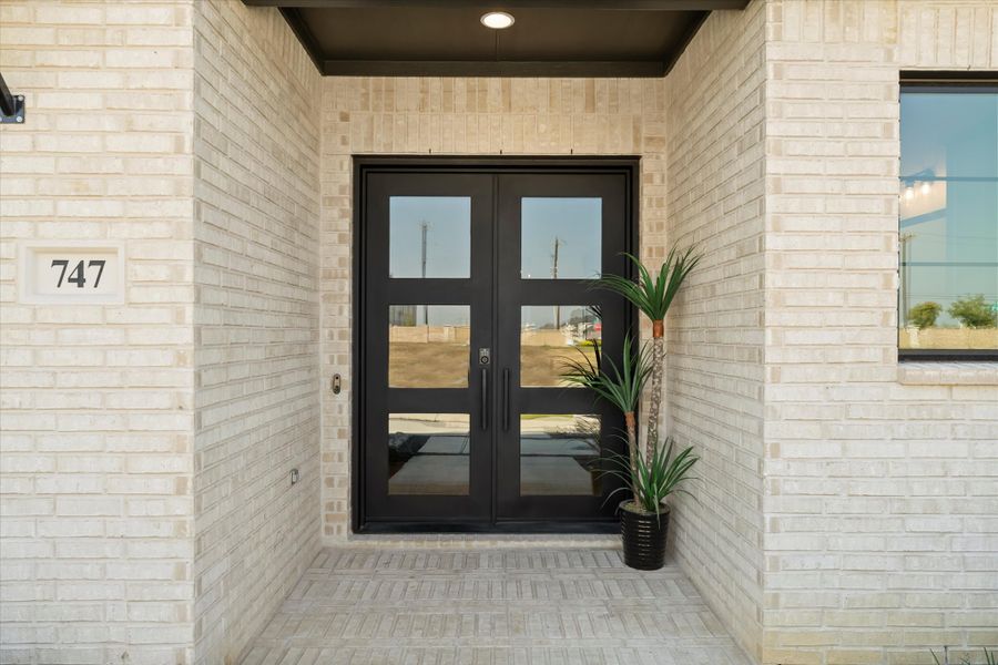 Exterior details and patio area of a home in Estates at Rockhill, Frisco (Image 2).