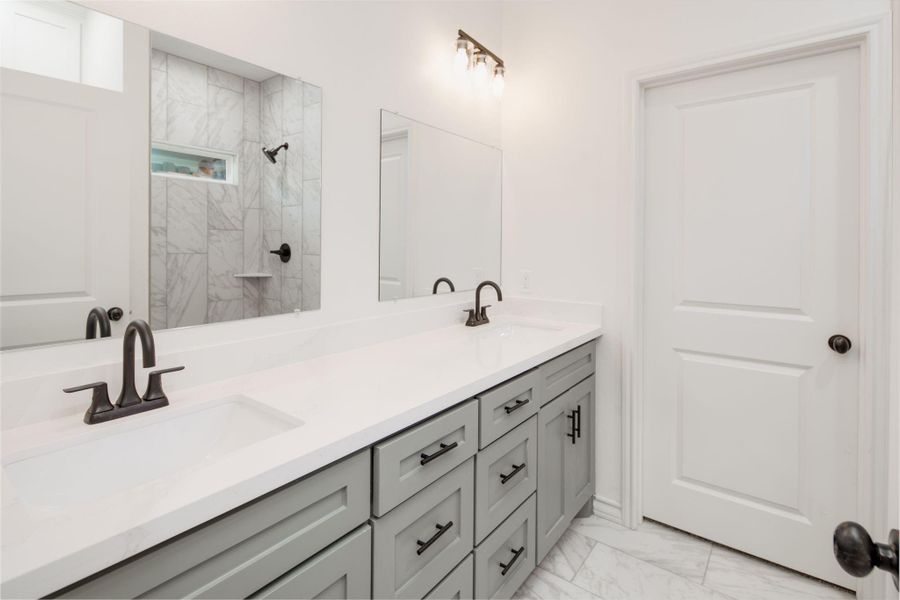 **Photos are of a previously built home with the same floorplan. Finishes are similar but not exact.