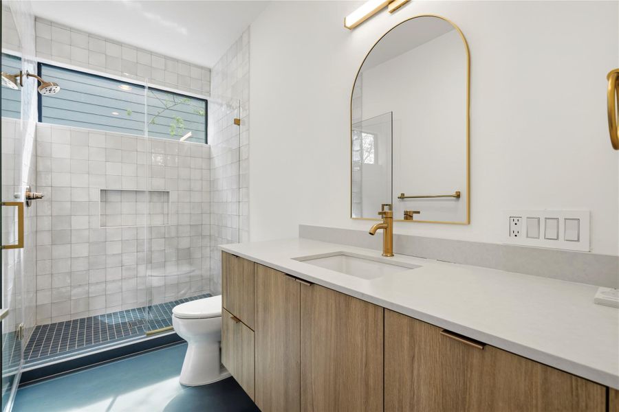 Many custom finishes in the ensuite bathroom.