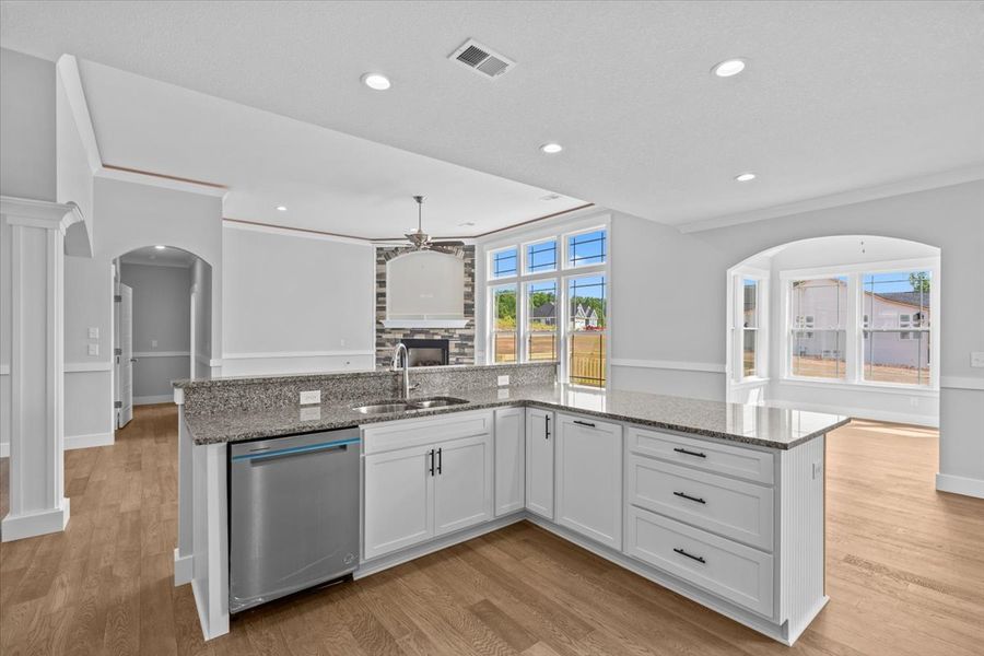 Representative furnished interior of a home built from the Hartford Elite by Enchanted Homes in Pointe Summit, Slater-Marietta (Image 11).
