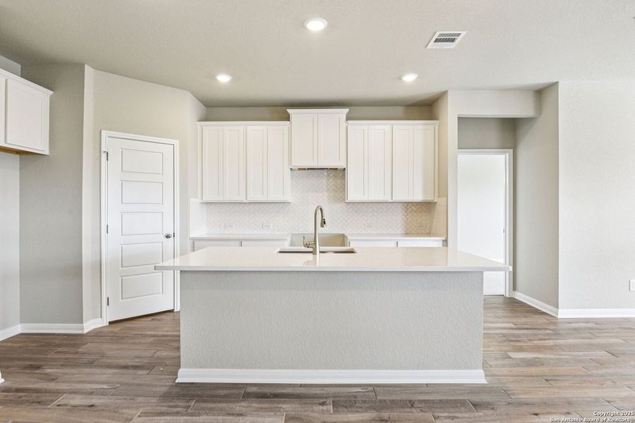 Furnished interior view inside a new home in Legendary Trails - Premier Series, Cibolo (Image 12). Furnished interior view inside a new home in Legendary Trails - Premier Series, Cibolo (Image 12).