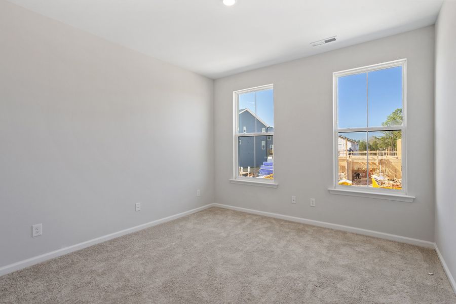 Spacious, unfurnished interior of a new home in Sweetbrier, Durham (Image 30).