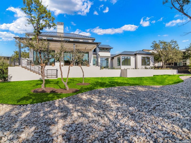 Exterior details and patio area of a home in , San Antonio (Image 34).