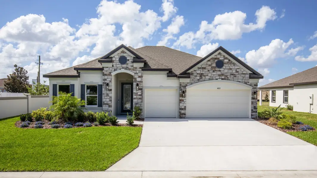 Representative exterior photo of a completed home built from the Sierra by Maronda Homes in Magnolia Estates, Lakeland, FL (Image 21).