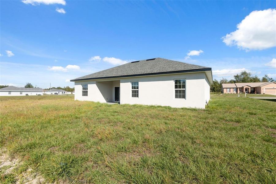 Exterior details and patio area of a home in , Ocala (Image 24).