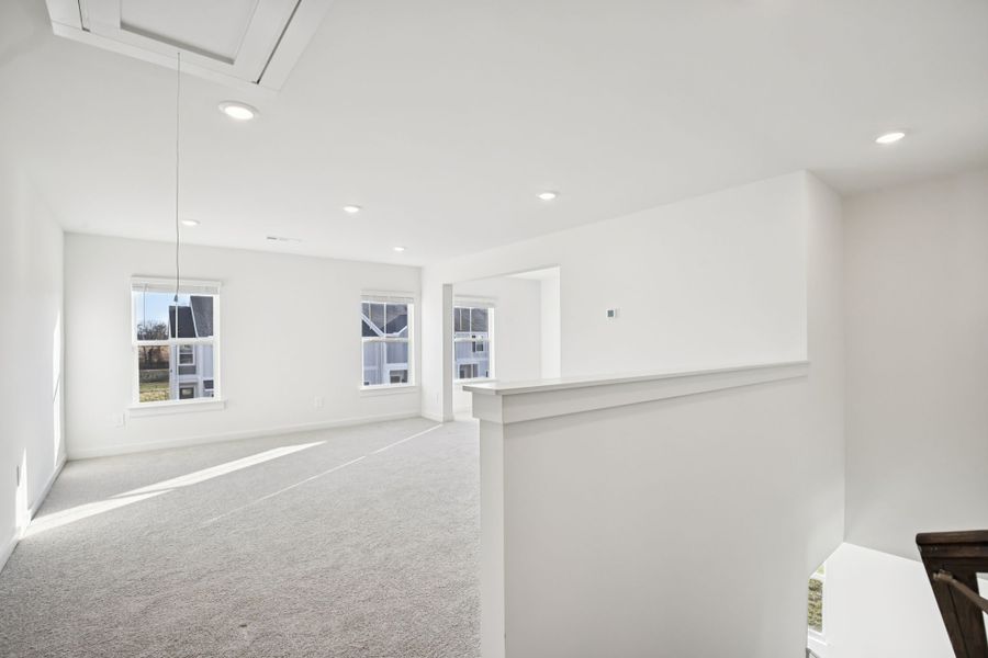 Spacious, unfurnished interior of a new home in Greystone - Vista Townhomes, Smyrna (Image 13).