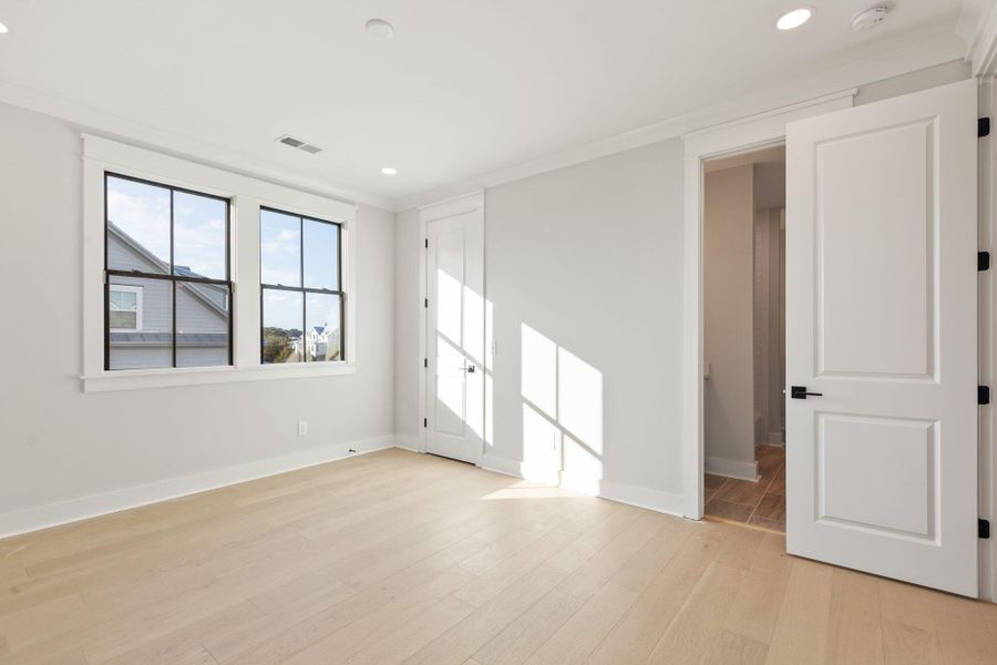 Spacious, unfurnished interior of a new home in Rivercroft, Awendaw (Image 46).