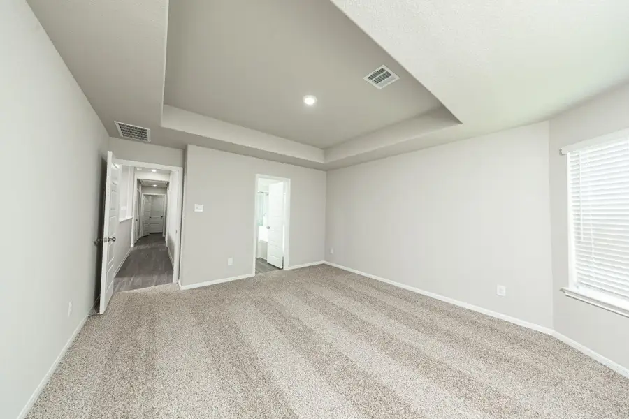 Spacious, unfurnished interior of a new home in Mackenzie Creek, Conroe (Image 10). Spacious, unfurnished interior of a new home in Mackenzie Creek, Conroe (Image 10).