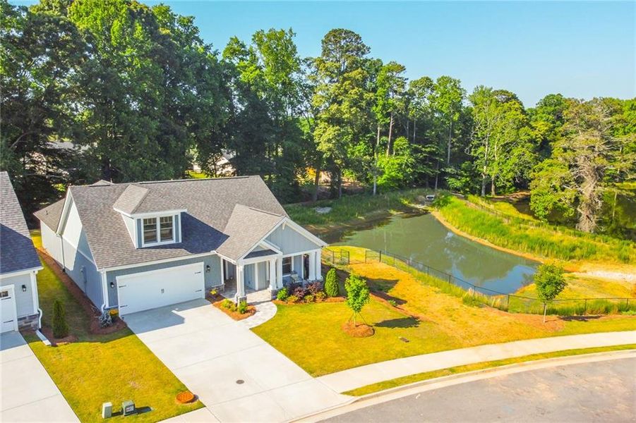 Front exterior of a new home in , Dacula, GA, highlighting curb appeal (Image 23).
