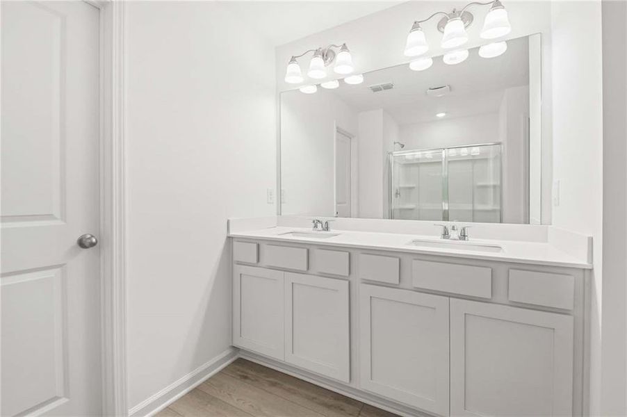 Furnished interior view inside a new home in The Pointe at Heron Bay, Locust Grove (Image 9).