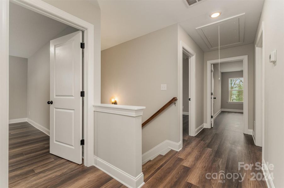 Large hallway with LVP flooring throughout the upstairs (Representative Photo)