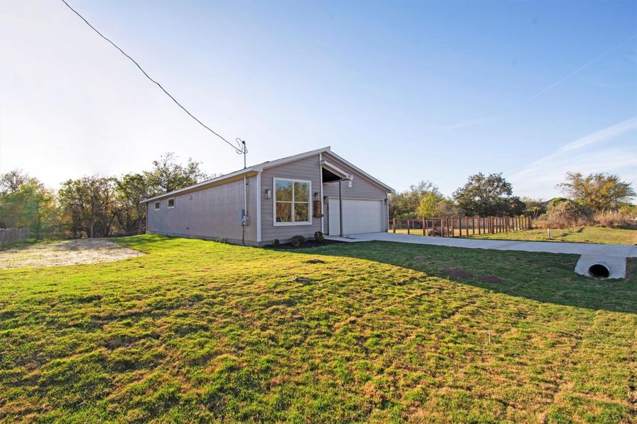 Exterior details and patio area of a home in , Bastrop (Image 26).