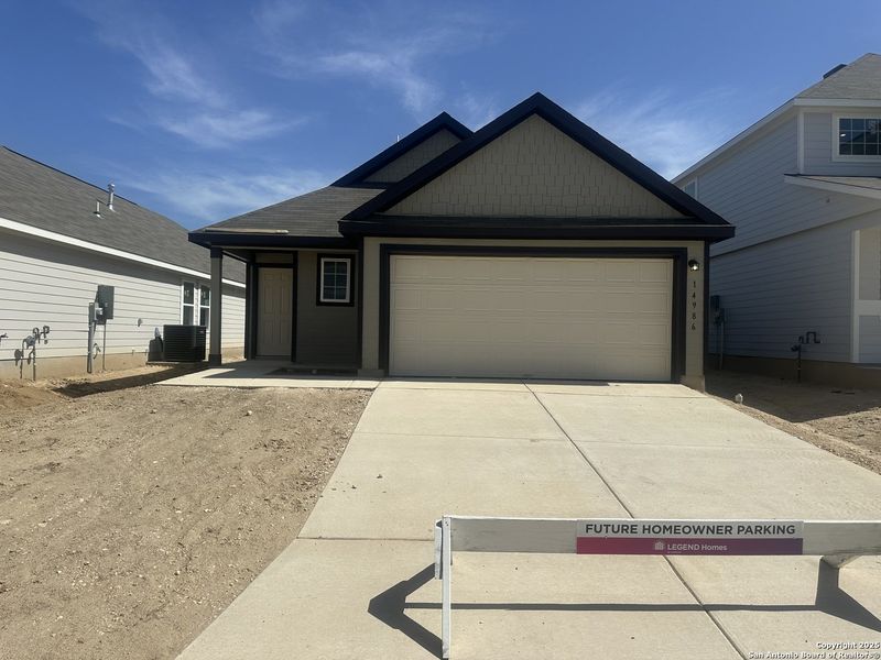 Front exterior of a new home in Timber Creek, San Antonio, TX, highlighting curb appeal (Image 1). Front exterior of a new home in Timber Creek, San Antonio, TX, highlighting curb appeal (Image 1).
