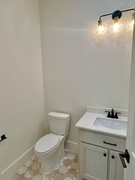 Bathroom featuring vanity and light tile patterned floors