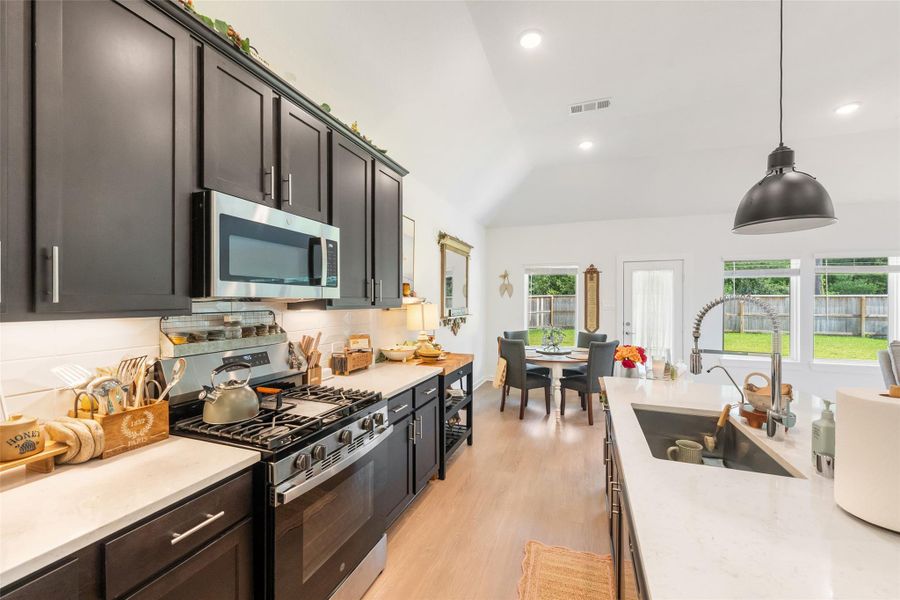 Furnished interior view inside a new home in Pinewood at Grand Texas, New Caney (Image 18).