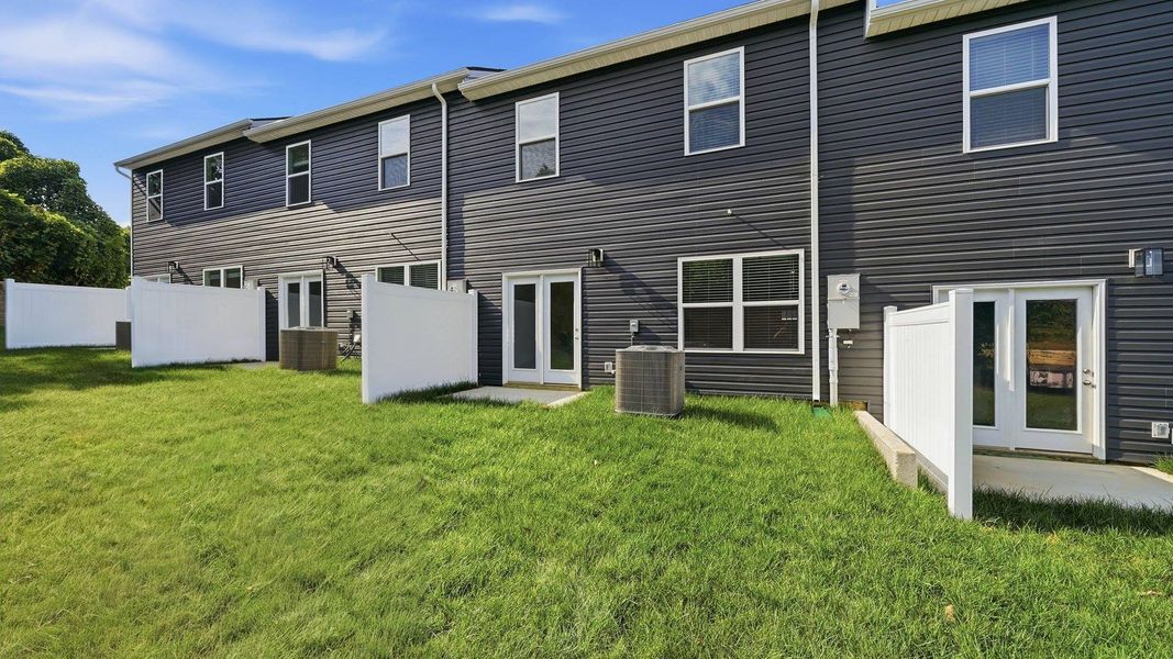 Exterior details and patio area of a home in The Arbor Townhomes, Kingsport (Image 16). Exterior details and patio area of a home in The Arbor Townhomes, Kingsport (Image 16).