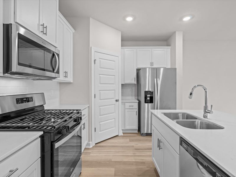 Furnished interior view inside a new home in Crossing at Abner Creek Townes, Greer (Image 7).