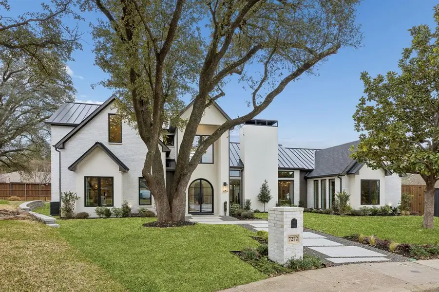 Front exterior of a new home in , Dallas, TX, highlighting curb appeal (Image 1). Front exterior of a new home in , Dallas, TX, highlighting curb appeal (Image 1).