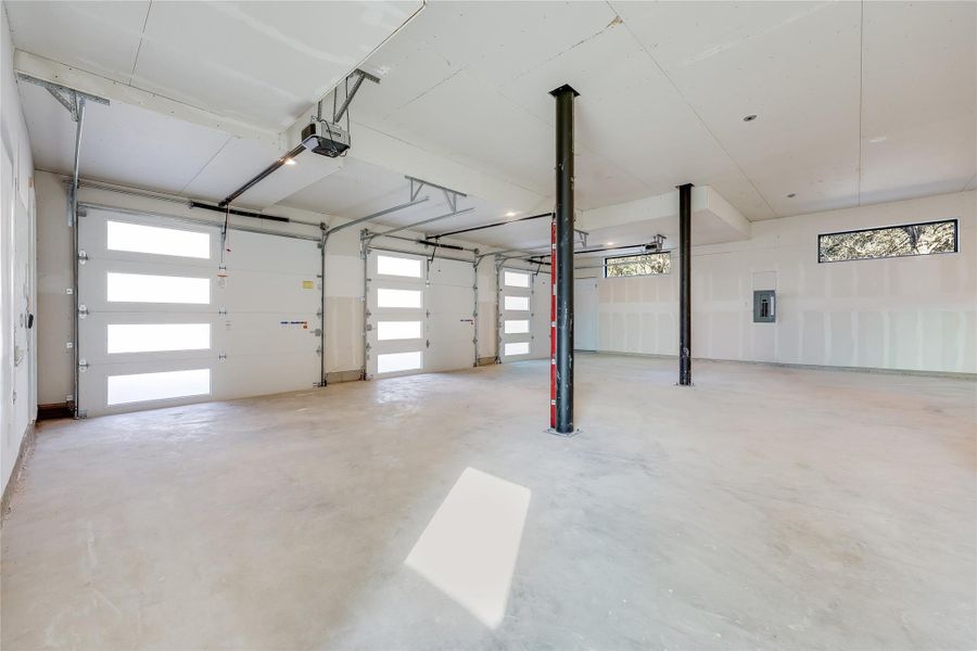 Garage with electric panel and a garage door opener Garage with electric panel and a garage door opener