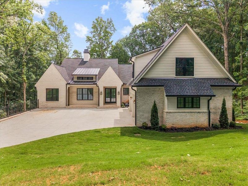 Front exterior of a new home in , Cumming, GA, highlighting curb appeal (Image 29).