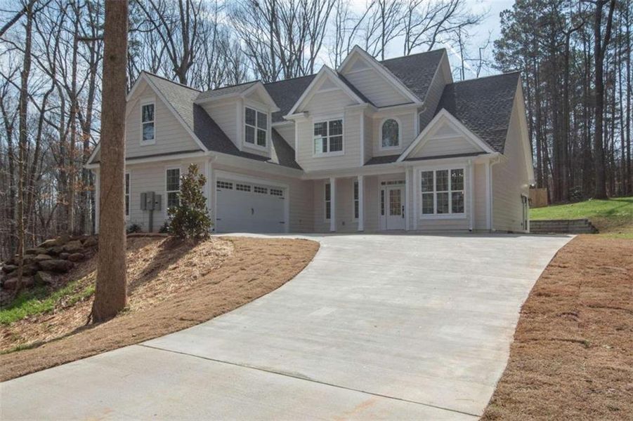 Front exterior of a new home in , Jonesboro, GA, highlighting curb appeal (Image 31).