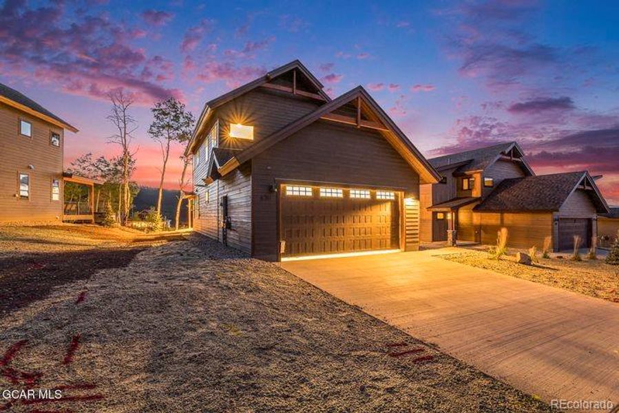Front exterior of a new home in , Granby, CO, highlighting curb appeal (Image 1). Front exterior of a new home in , Granby, CO, highlighting curb appeal (Image 1).