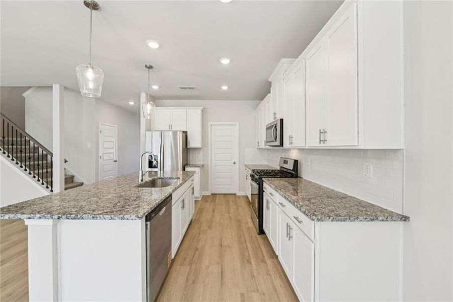 Furnished interior view inside a new home in Martin Springs - Estate Series, Lawrenceville (Image 6). Furnished interior view inside a new home in Martin Springs - Estate Series, Lawrenceville (Image 6).