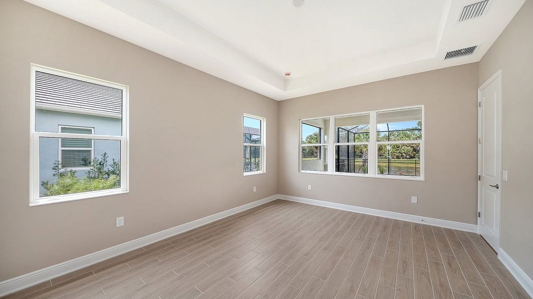 Spacious, unfurnished interior of a new home in Grand Park Real Estate and Homes for Sale in Sarasota, FL - Neal Communities, Sarasota (Image 32). Spacious, unfurnished interior of a new home in Grand Park Real Estate and Homes for Sale in Sarasota, FL - Neal Communities, Sarasota (Image 32).