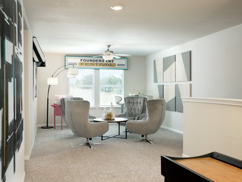 The upstairs flex space is perfect for a game or hobby room.