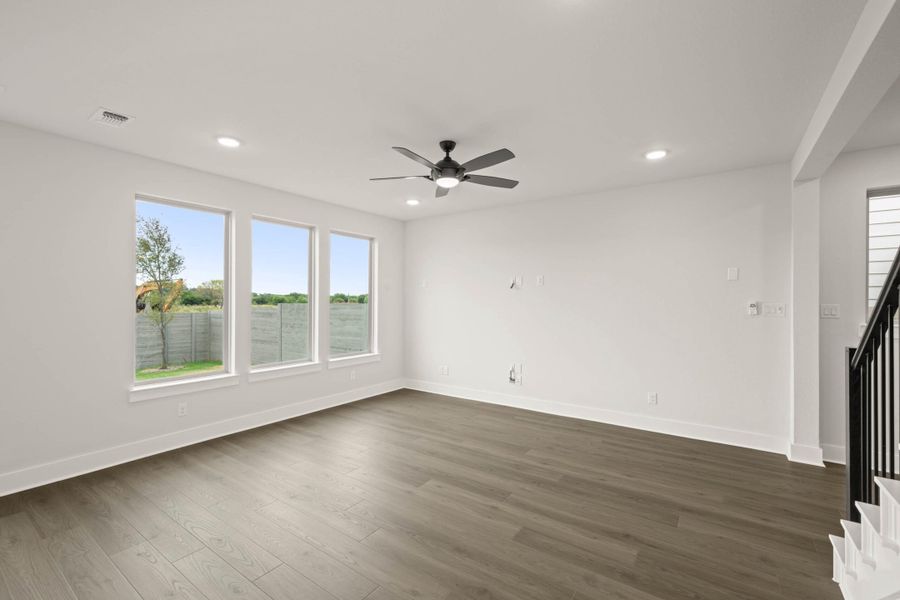 Spacious, unfurnished interior of a new home in Cottage Collection at Harvest, Argyle (Image 15).