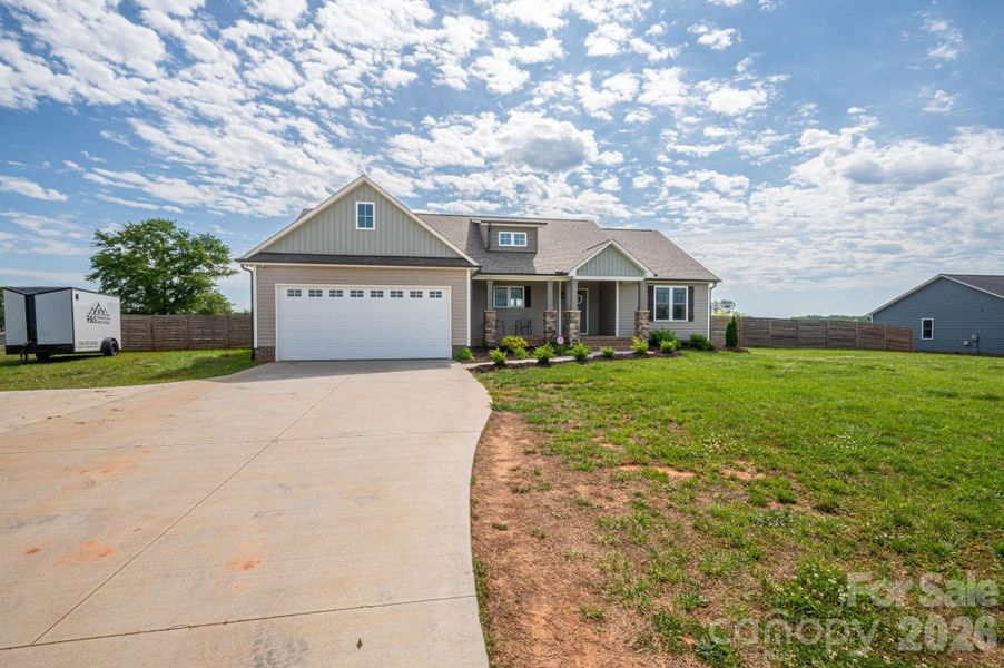 Front exterior of a new home in , Lincolnton, NC, highlighting curb appeal (Image 23).
