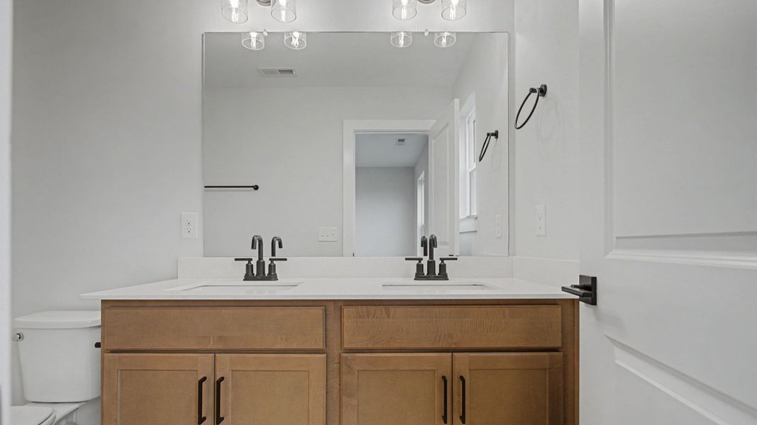 Private secondary bathroom attached to upstairs bedroom