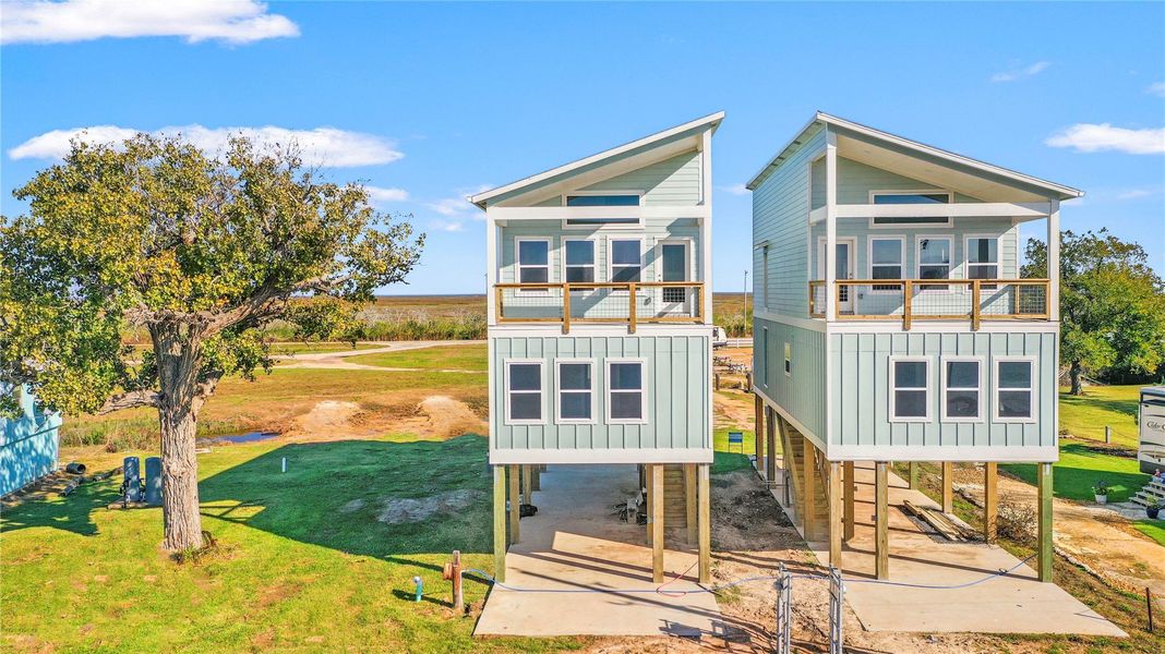 Front exterior of a new home in , Matagorda, TX, highlighting curb appeal (Image 14). Front exterior of a new home in , Matagorda, TX, highlighting curb appeal (Image 14).