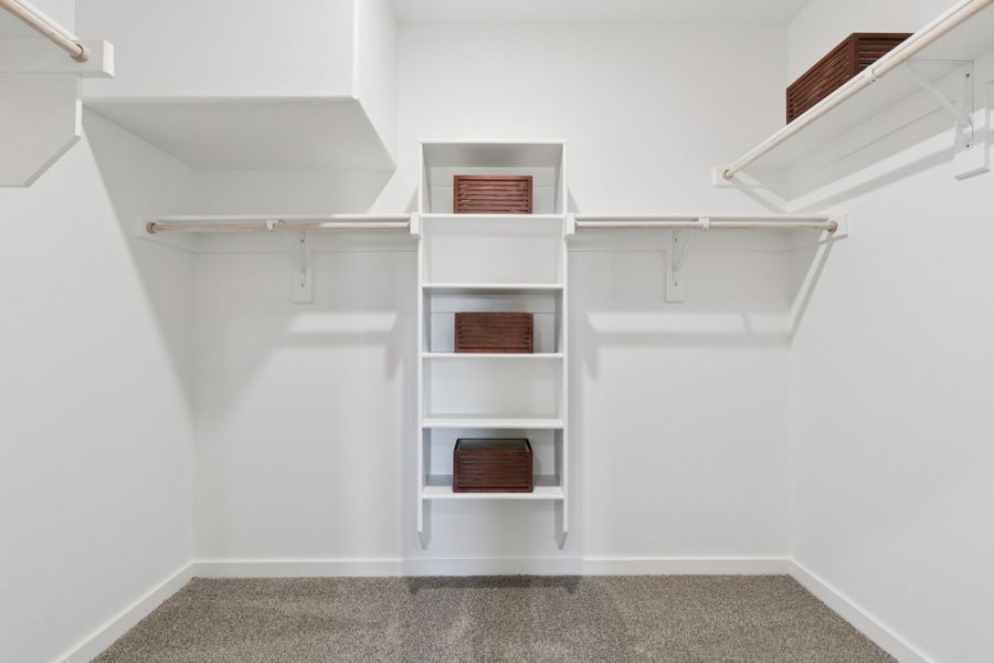 Primary Closet in the Magnolia home plan by Trophy Signature Homes – REPRESENTATIVE PHOTO