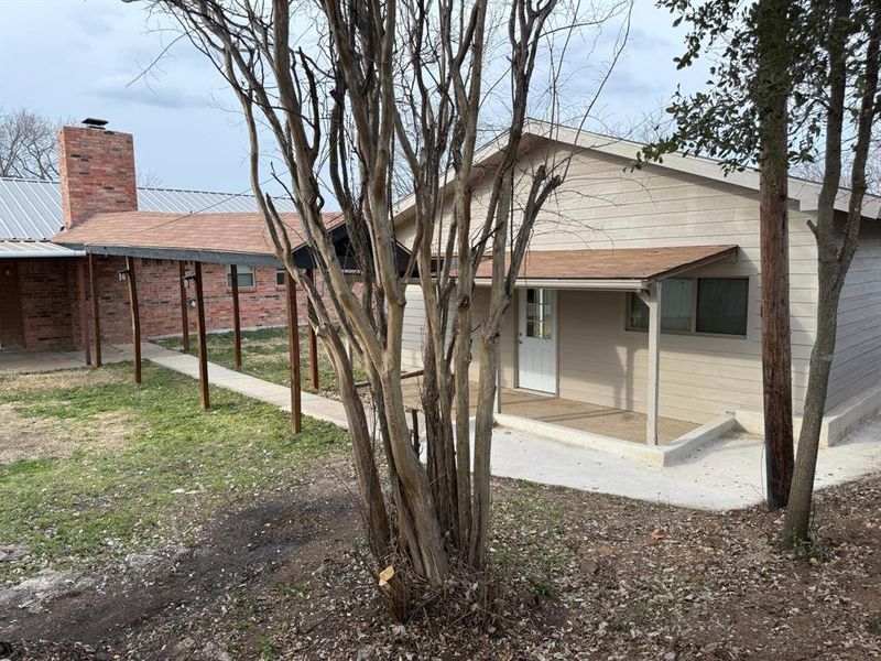Exterior details and patio area of a home in , Joshua (Image 24).