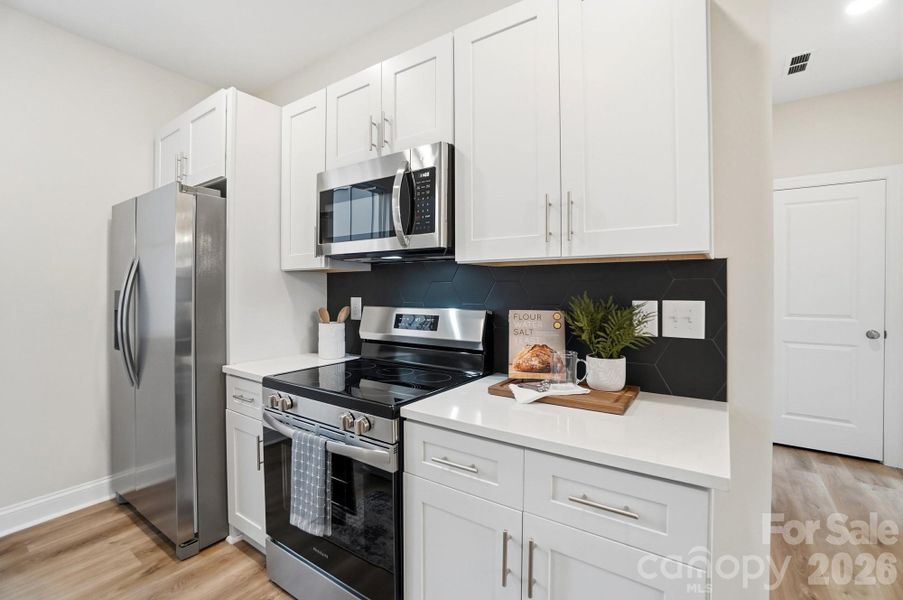 Furnished interior view inside a new home in , Charlotte (Image 8). Furnished interior view inside a new home in , Charlotte (Image 8).