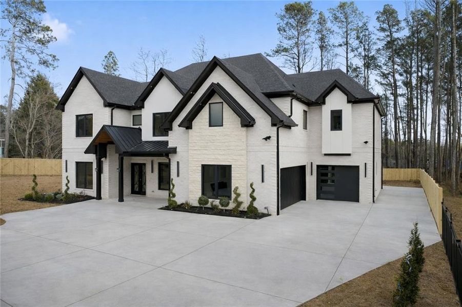 Front exterior of a new home in , Lawrenceville, GA, highlighting curb appeal (Image 30).