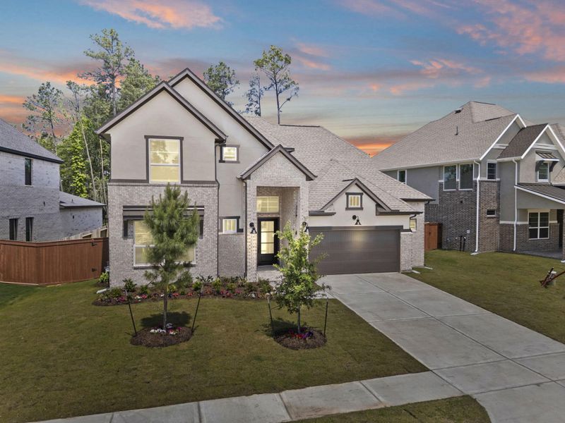 Front exterior of a new home in Evergreen, Conroe, TX, highlighting curb appeal (Image 26).