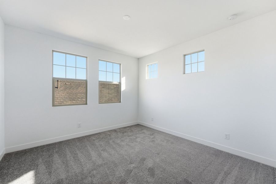 Spacious, unfurnished interior of a new home in Ellsworth Ranch, Queen Creek (Image 34).