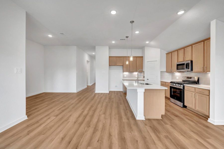 Furnished interior view inside a new home in Pinewood at Grand Texas, New Caney (Image 6).