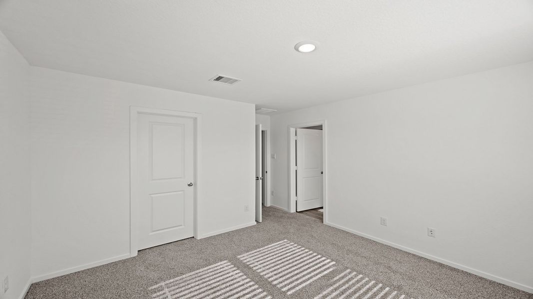 Spacious, unfurnished interior of a new home in Bridges on Lake Houston Villas, Humble (Image 8).