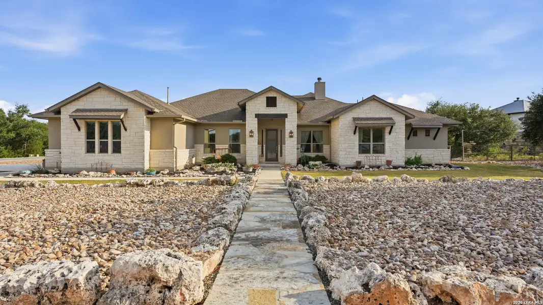 Front exterior of a new home in , Spring Branch, TX, highlighting curb appeal (Image 21).