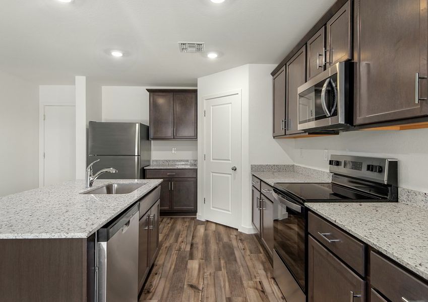 The kitchen comes with upgraded appliances included.