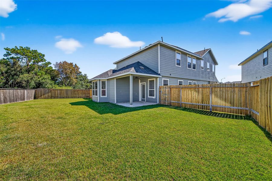 Exterior details and patio area of a home in Anderson Lakes, Houston (Image 21). Exterior details and patio area of a home in Anderson Lakes, Houston (Image 21).