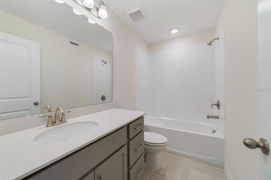 Furnished interior view inside a new home in Towns at Greenleaf, Oviedo (Image 4). Furnished interior view inside a new home in Towns at Greenleaf, Oviedo (Image 4).