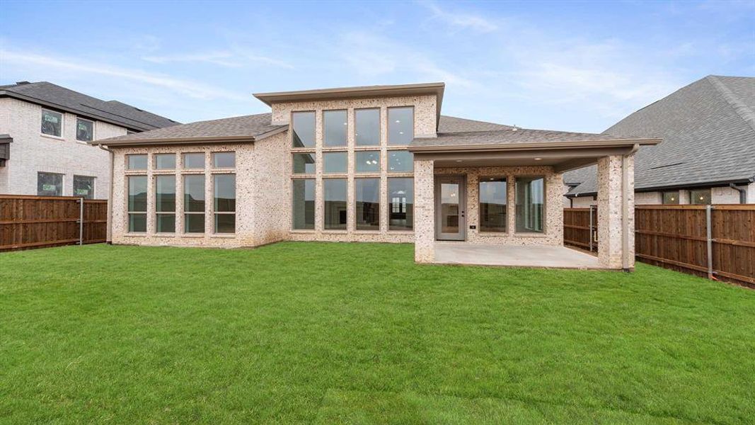 Exterior details and patio area of a home in North Sky 55', Celina (Image 4).