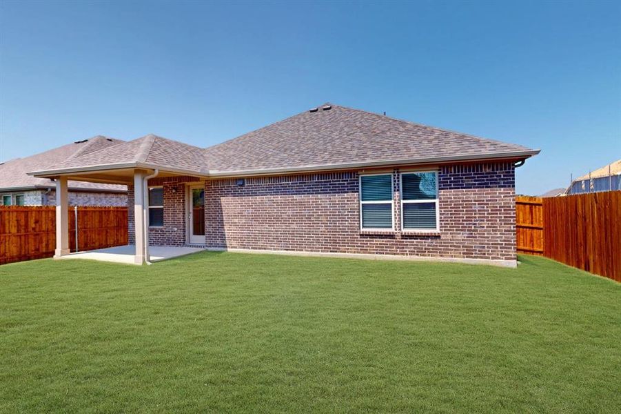 Front exterior of a new home in Sagebrook, Argyle, TX, highlighting curb appeal (Image 15). Front exterior of a new home in Sagebrook, Argyle, TX, highlighting curb appeal (Image 15).
