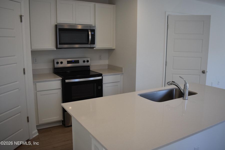 Furnished interior view inside a new home in Irongate Villas, Jacksonville (Image 10).