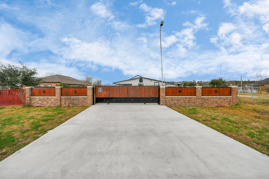 Front exterior of a new home in , Cleveland, TX, highlighting curb appeal (Image 21).