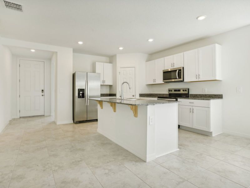 Kitchen in the Daphne floorplan at 2326 White Tail Street